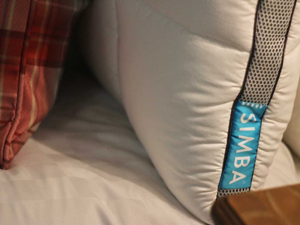 Premium bedding, memory foam beds, in-room safe, laptop workspace