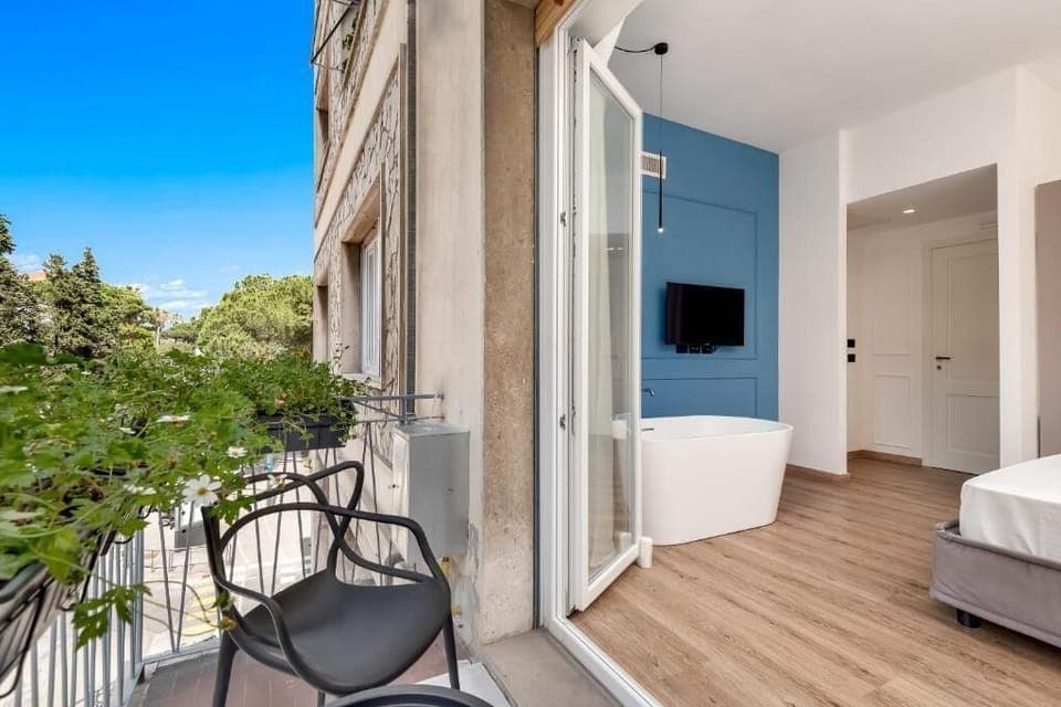 Deluxe Double Room, Balcony | Minibar, desk, blackout drapes, soundproofing