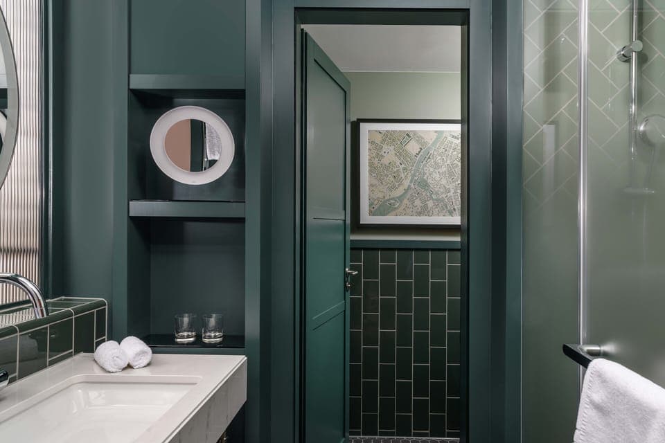 Rainfall showerhead, designer toiletries, hair dryer, bathrobes