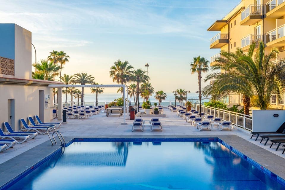 Outdoor pool, pool umbrellas, sun loungers