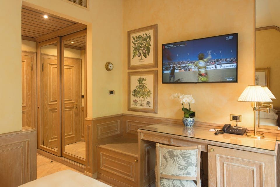 Single Room (French Bed) | Living area | 50-inch TV with satellite channels, streaming services