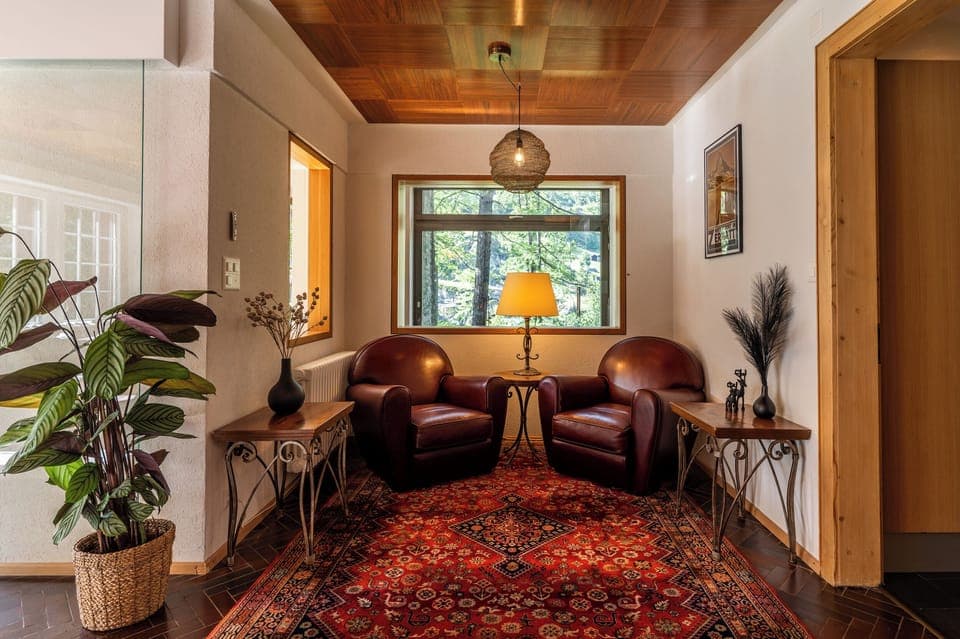 Luxury Chalet, Mountain View | Living area | 42-inch flat-screen TV with cable channels