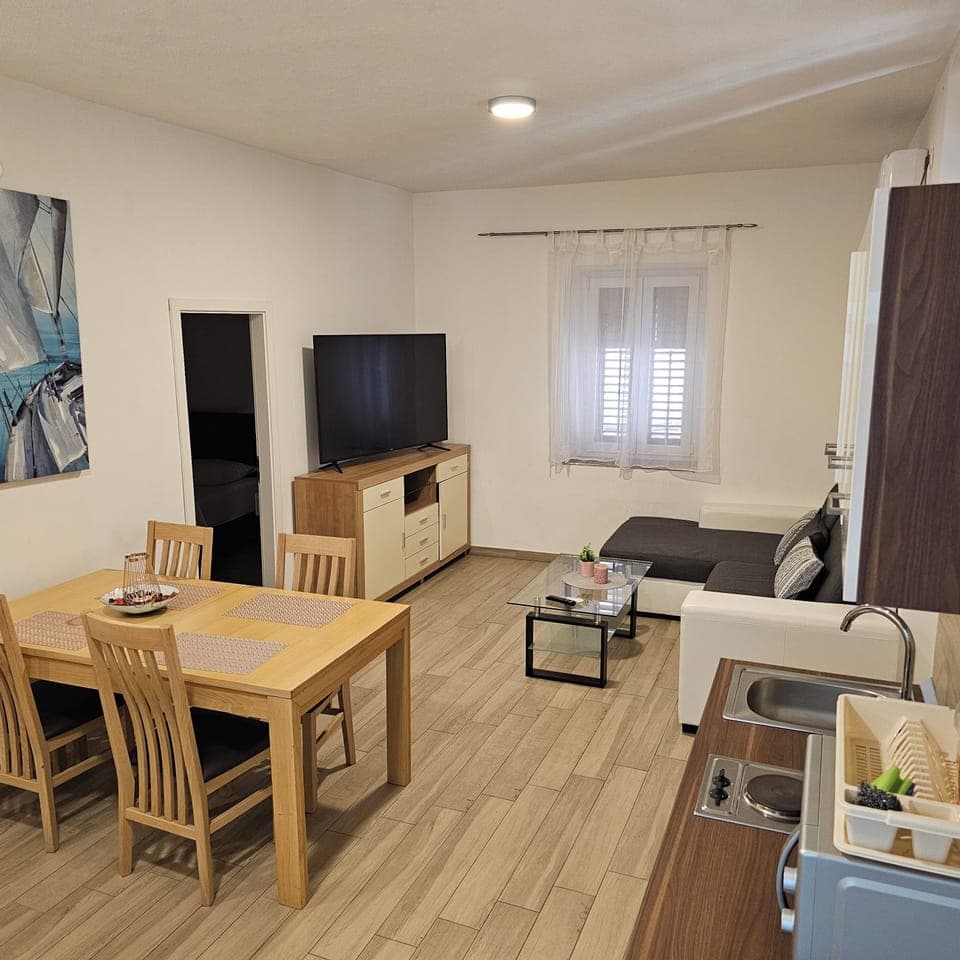 Comfort Apartment, 2 Bedrooms | Living area | Flat-screen TV
