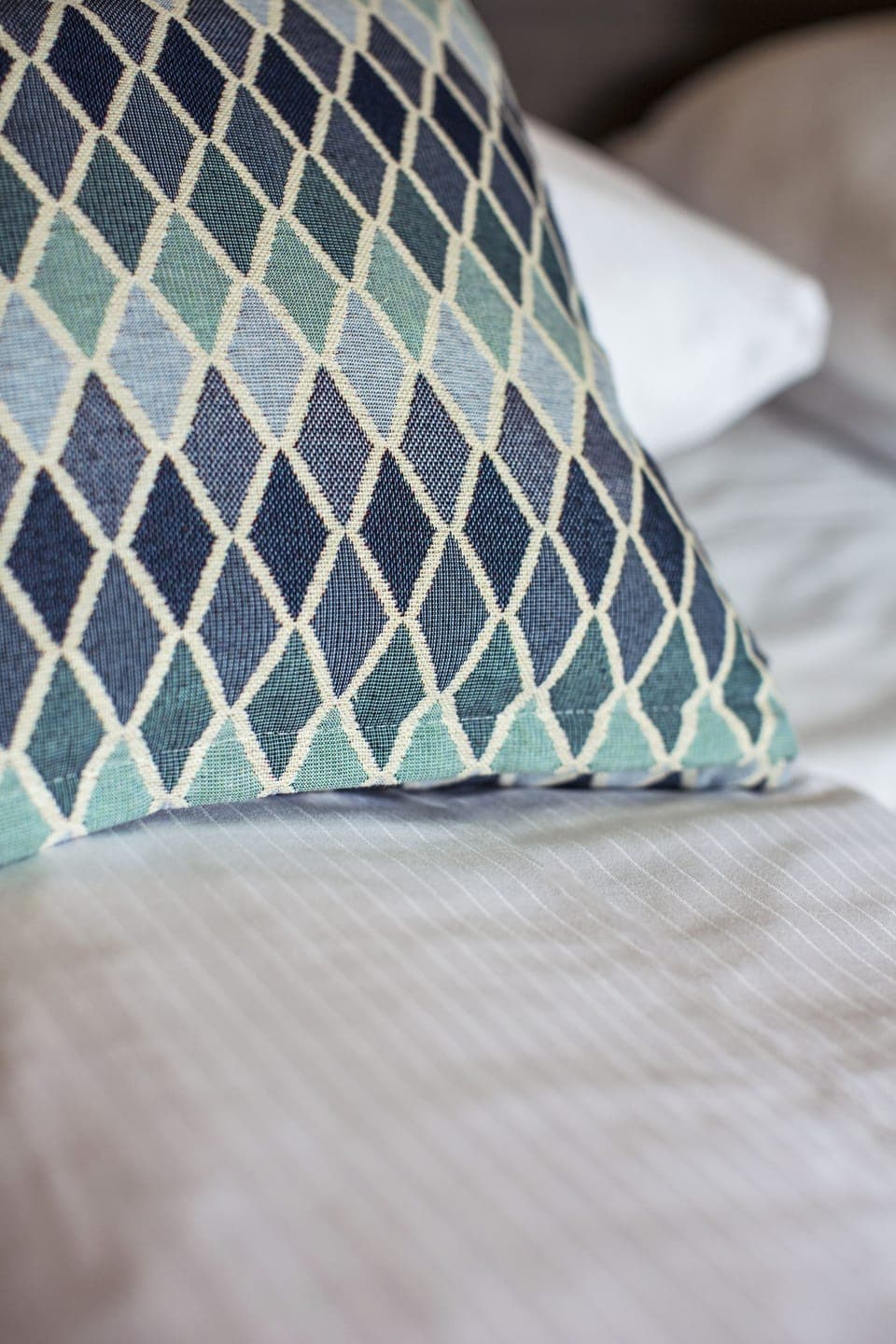 Premium bedding, pillowtop beds, desk, blackout drapes