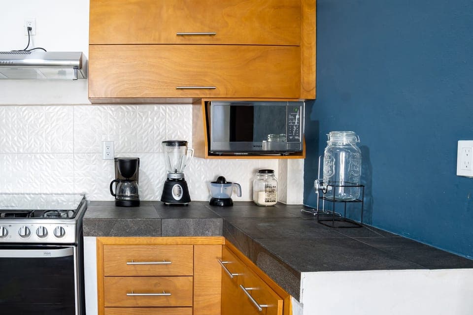 Deluxe Cottage, Garden View | Private kitchen | Electric kettle