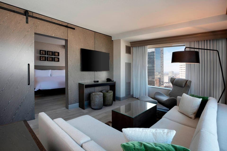Junior Suite, 1 Bedroom | Living area | 55-inch flat-screen TV with digital channels, Smart TV, pay movies