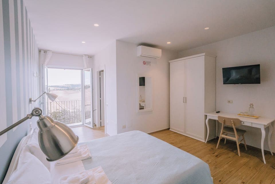 Double Room, Sea View | Desk, laptop workspace, blackout drapes, soundproofing