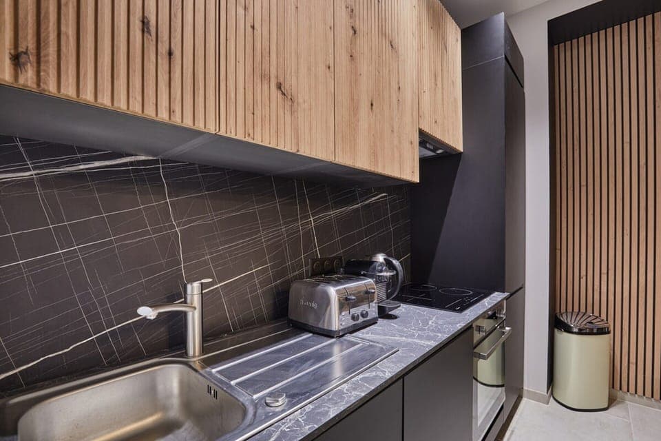 Apartment | Private kitchen | Cleaning supplies