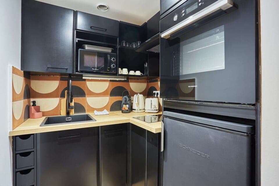 Apartment | Private kitchen | Cleaning supplies