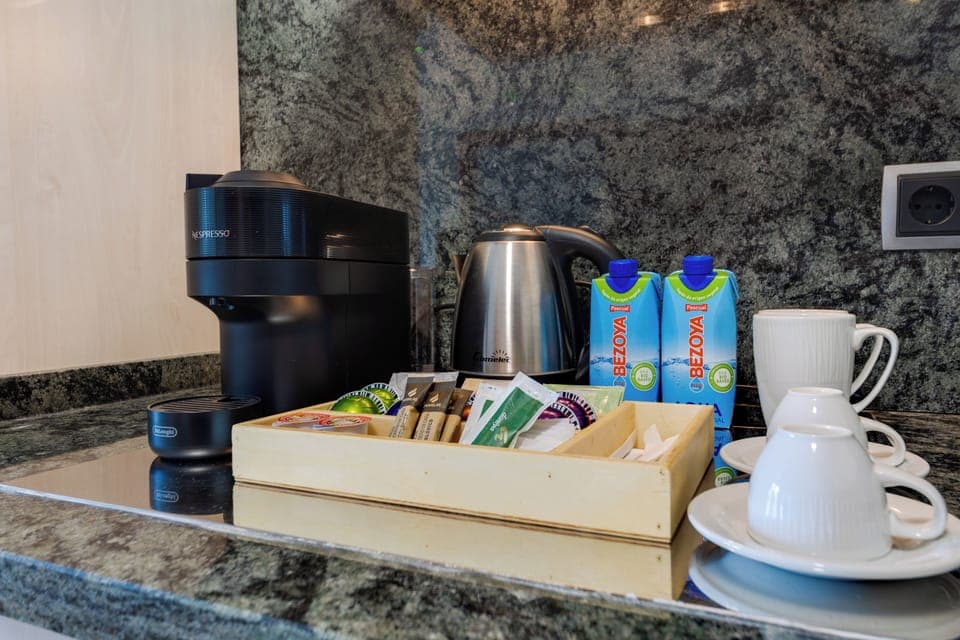 Junior Suite, Balcony, Sea View | In-room safe, desk, iron/ironing board, free WiFi