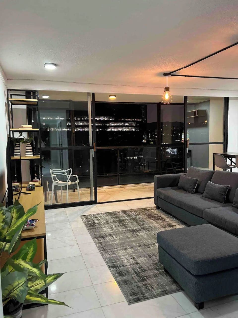 Apartment, Multiple Bedrooms, Balcony, City View | Living area | TV