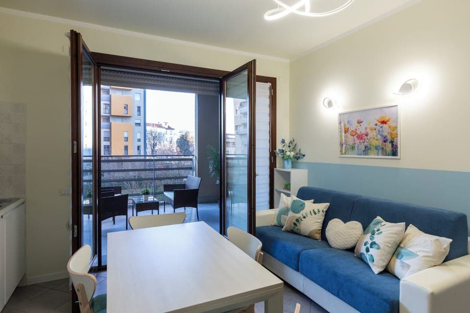 Deluxe Apartment, Garden View | Living area | 50-cm TV with digital channels