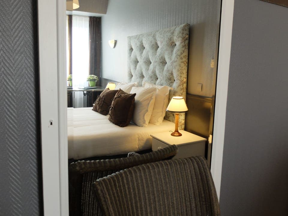 Premium bedding, blackout drapes, free WiFi, bed sheets