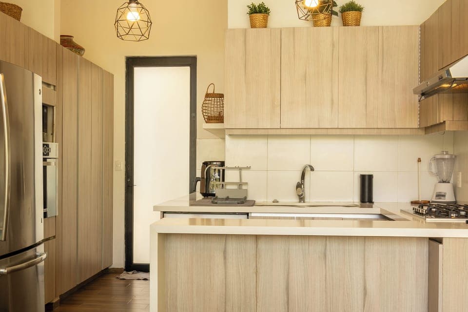 Deluxe House, Patio, Garden View | Private kitchen