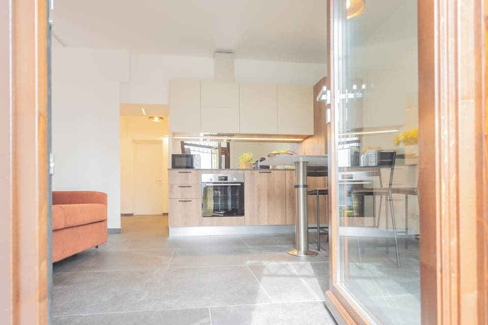 Apartment (1 Bedroom) | Living area | 32-inch Smart TV with digital channels