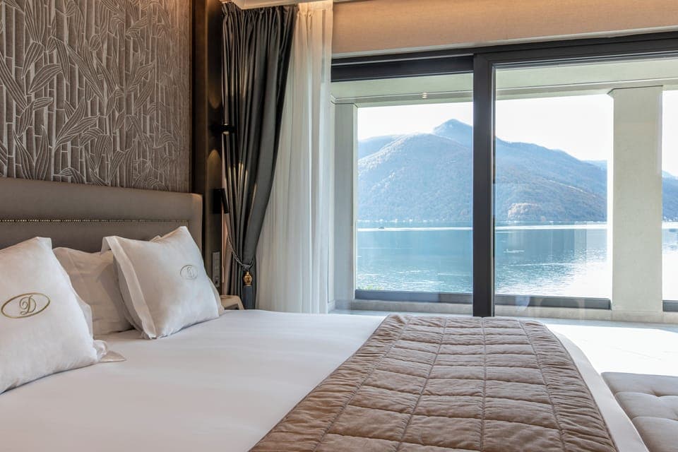 Junior Suite, Terrace, Lake View | Minibar, in-room safe, blackout drapes, free WiFi