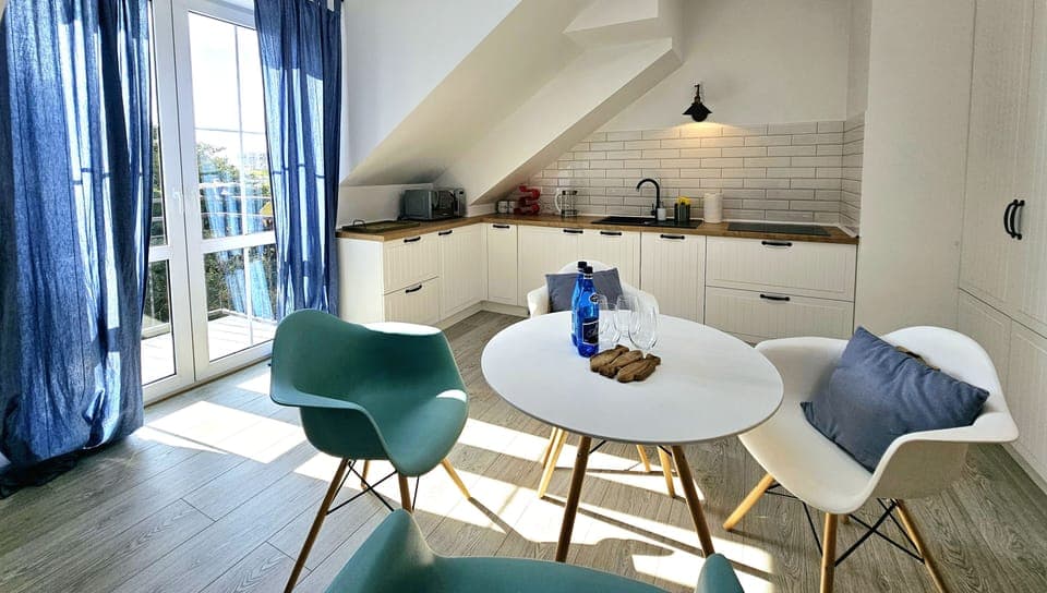 Comfort Apartment, Balcony | Living area | 50-inch LCD TV with cable channels