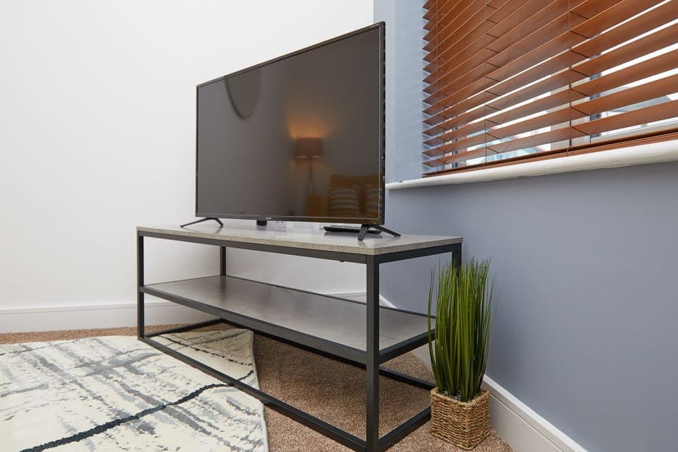 Premier Townhome, 2 Bedrooms, Kitchen, City View | Living area | TV