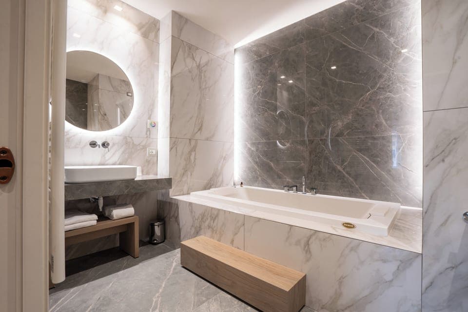 Suite, River View | Bathroom | Hair dryer, bathrobes, slippers, towels