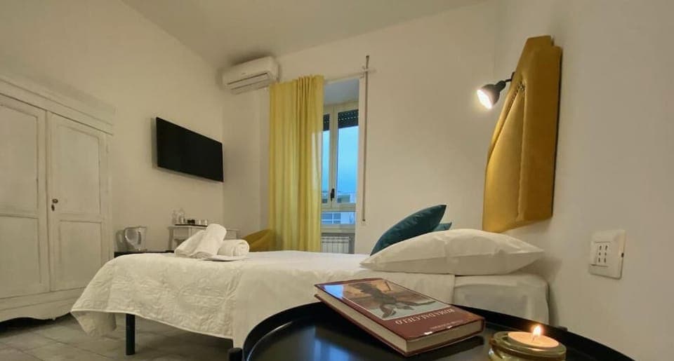 Deluxe Quadruple Room | In-room safe, iron/ironing board, free WiFi