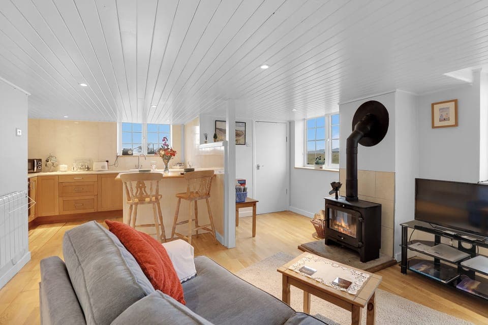 Cottage | Living area | 30-inch TV with satellite channels