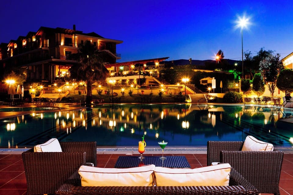 Seasonal outdoor pool, open 11:00 AM to 7:00 PM, pool umbrellas