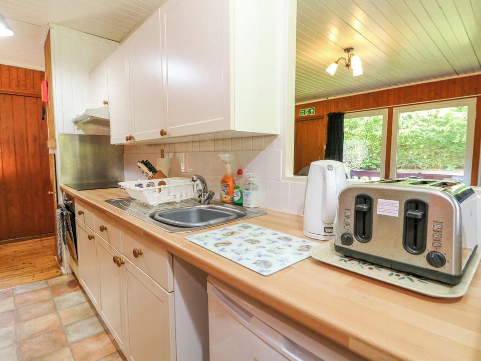 Fridge, electric kettle, toaster, cookware/dishes/utensils