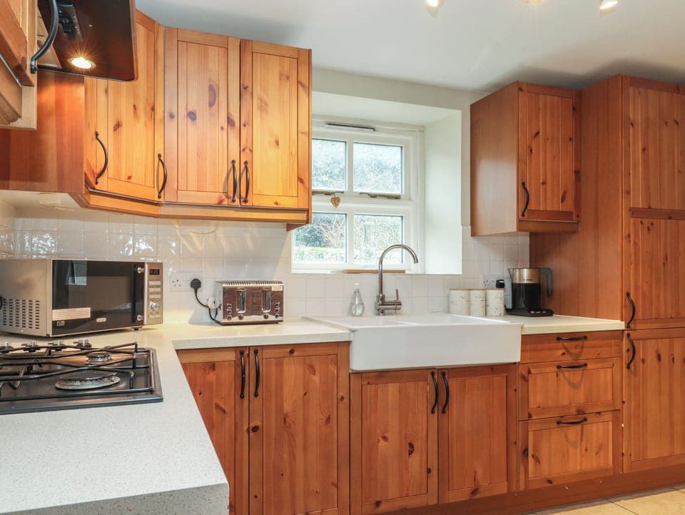 Fridge, electric kettle, toaster, cookware/dishes/utensils