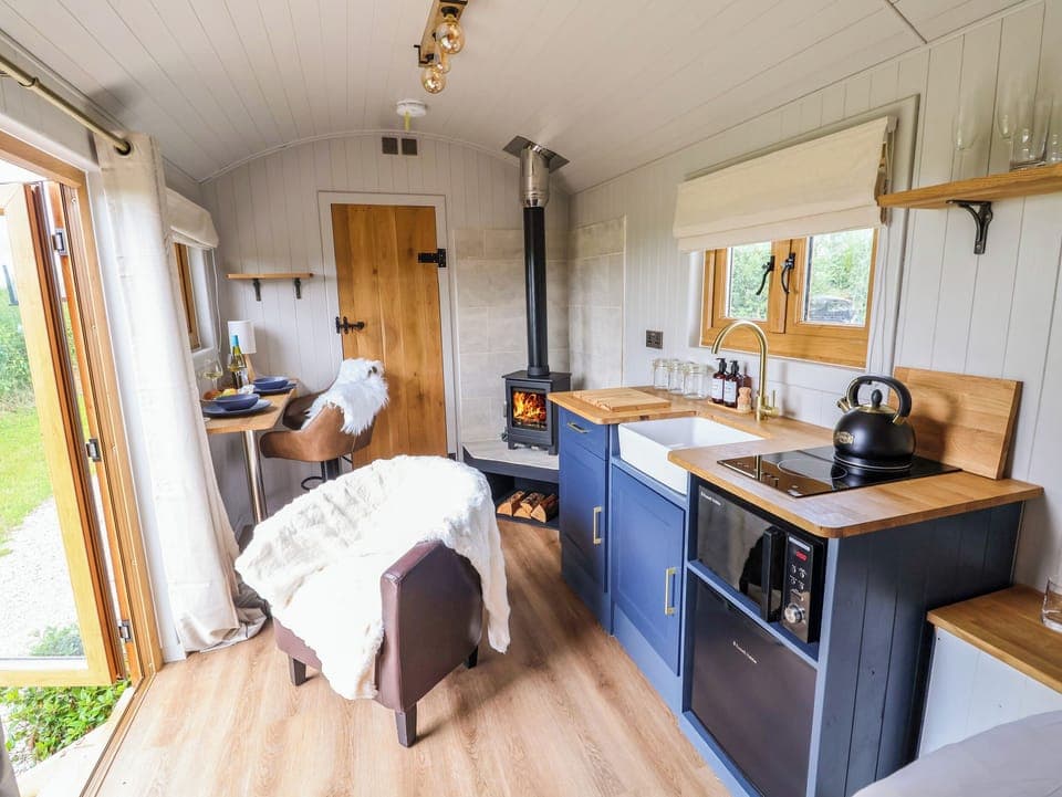 Fridge, electric kettle, toaster, cookware/dishes/utensils