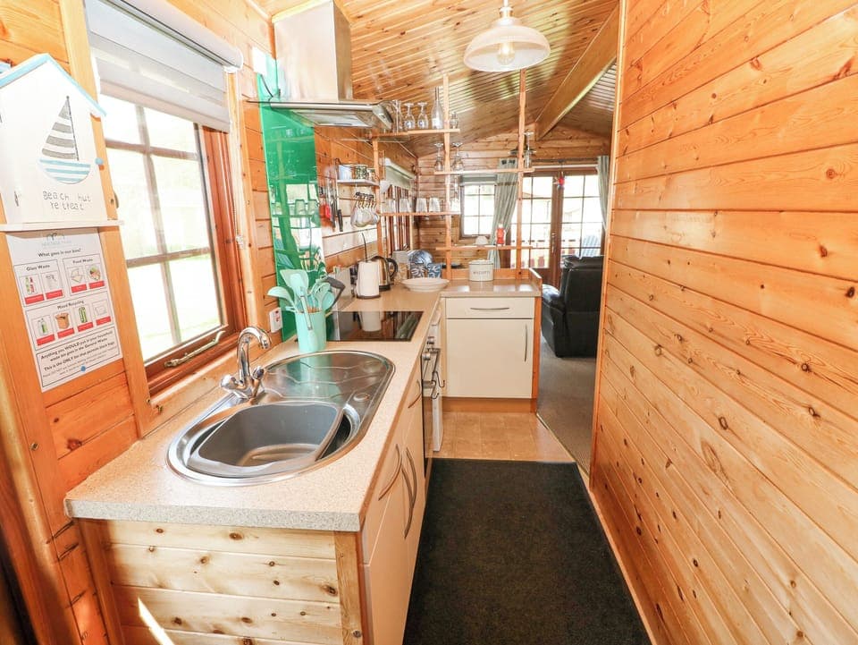 Fridge, electric kettle, toaster, cookware/dishes/utensils