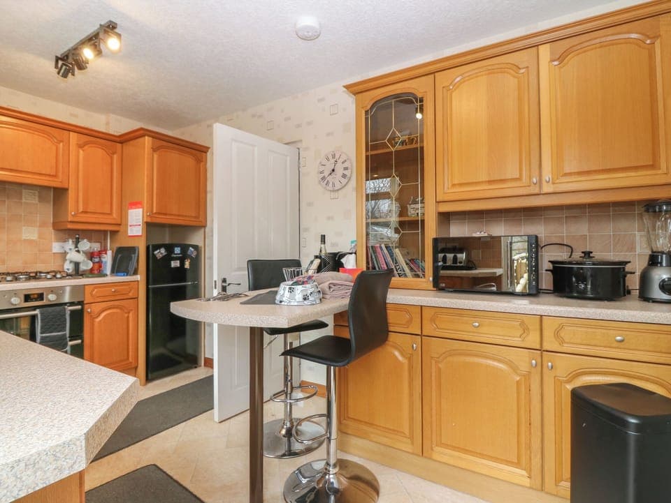 Fridge, electric kettle, toaster, cookware/dishes/utensils