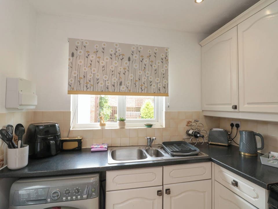 Fridge, electric kettle, toaster, cookware/dishes/utensils