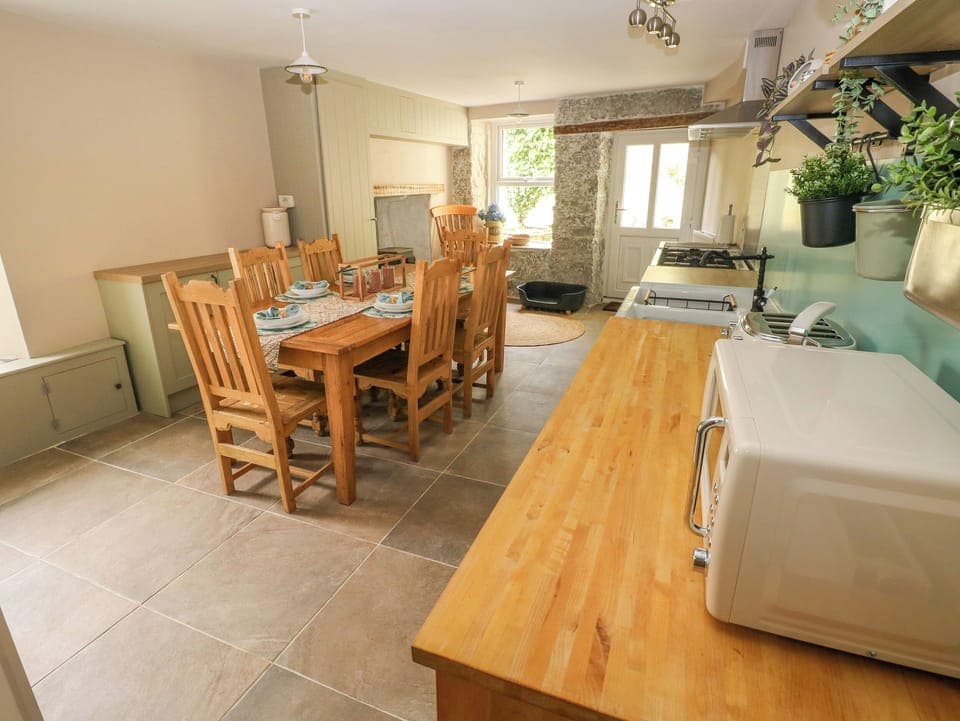 Fridge, electric kettle, toaster, cookware/dishes/utensils