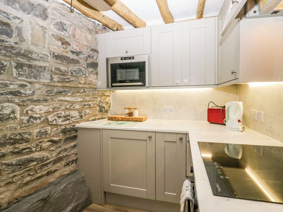 Fridge, electric kettle, cookware/dishes/utensils