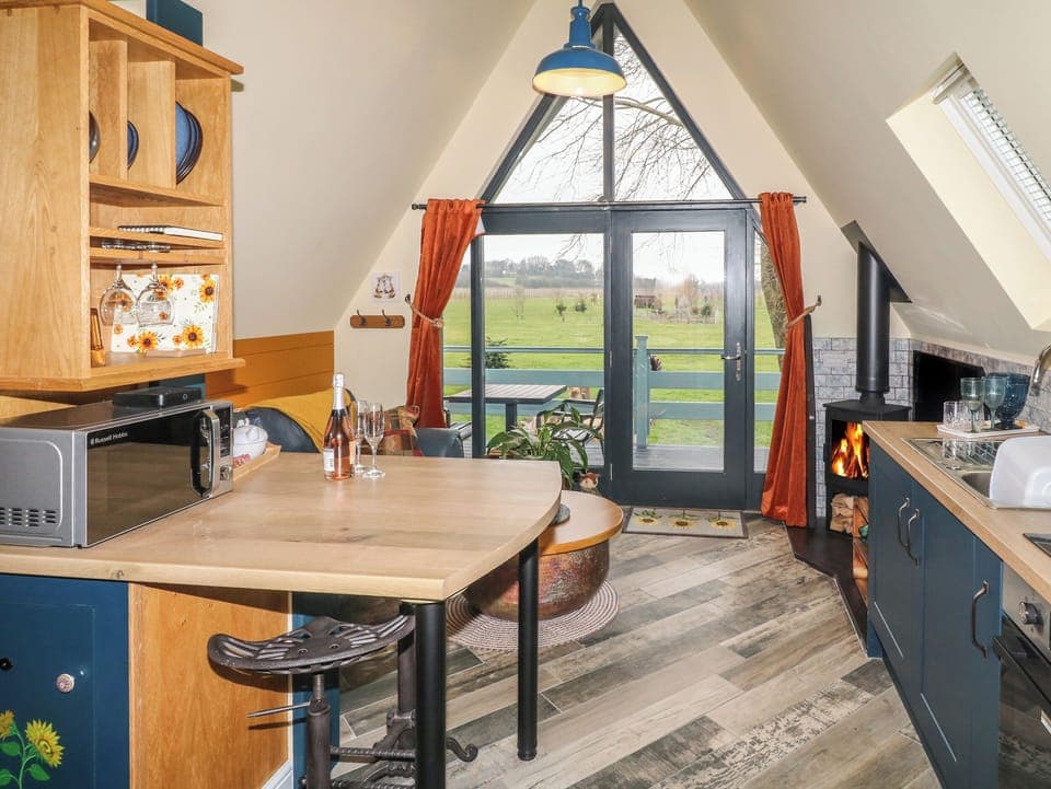 Fridge, electric kettle, cookware/dishes/utensils