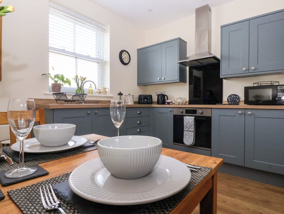 Fridge, electric kettle, toaster, cookware/dishes/utensils