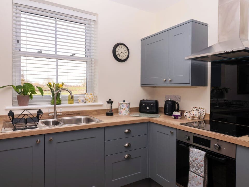 Fridge, electric kettle, toaster, cookware/dishes/utensils