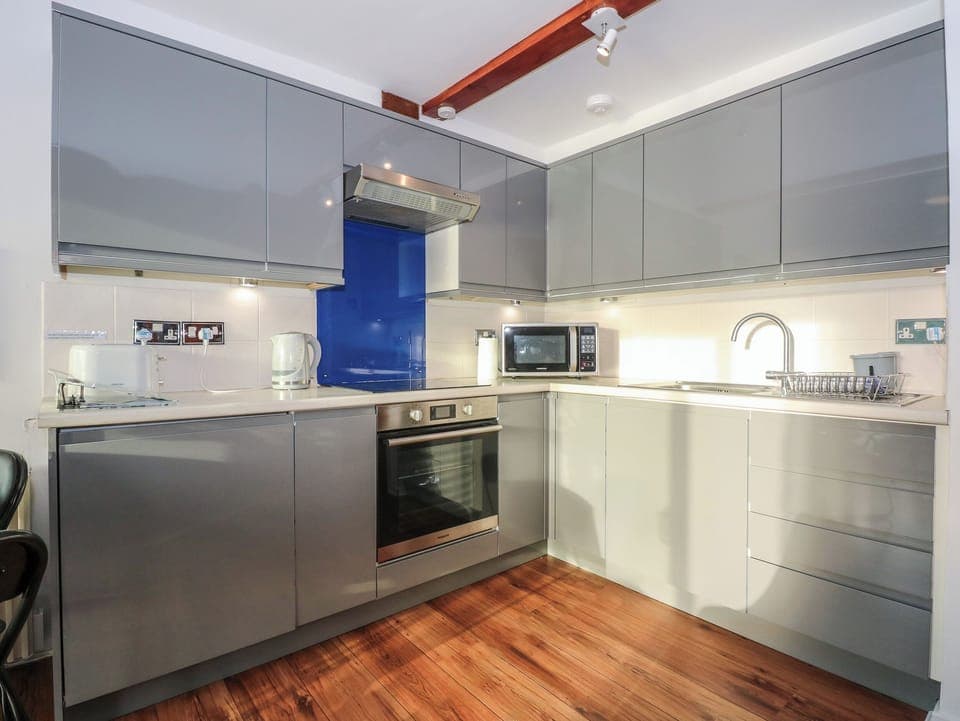 Fridge, electric kettle, toaster, cookware/dishes/utensils