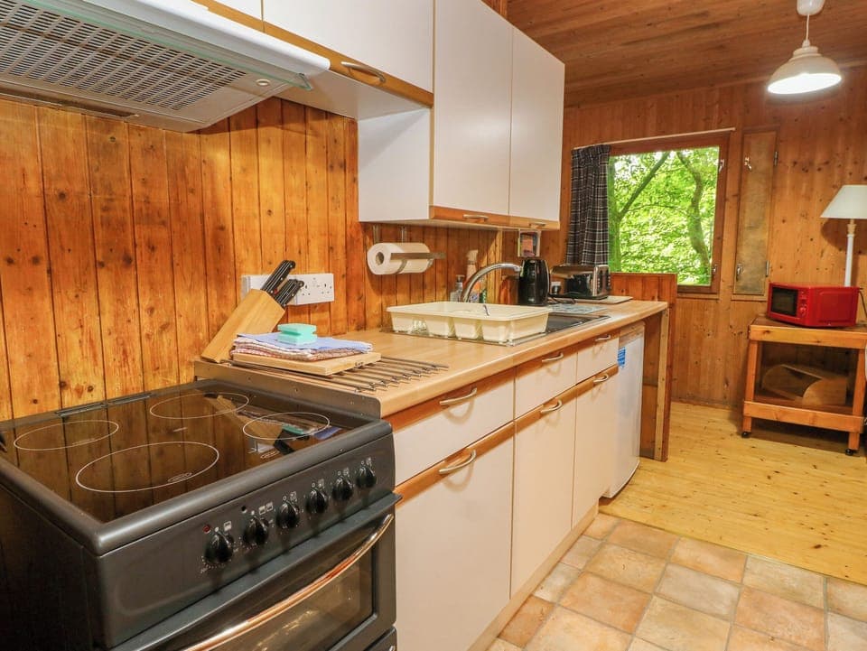 Fridge, electric kettle, toaster, cookware/dishes/utensils