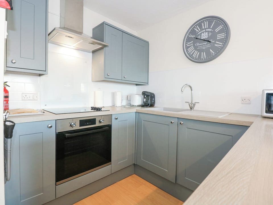 Fridge, electric kettle, toaster, cookware/dishes/utensils