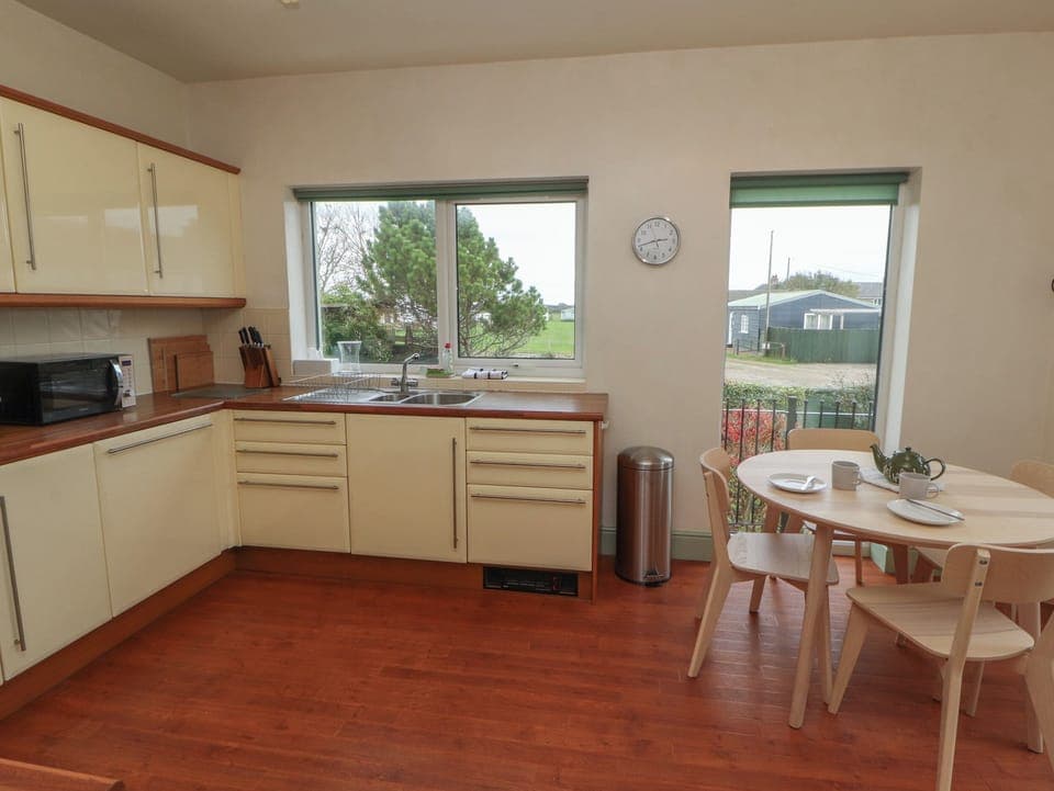 Fridge, dishwasher, toaster, cookware/dishes/utensils