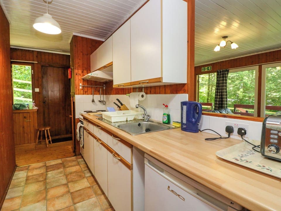 Fridge, electric kettle, toaster, cookware/dishes/utensils