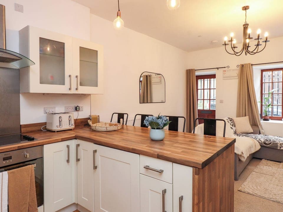 Fridge, electric kettle, toaster, cookware/dishes/utensils