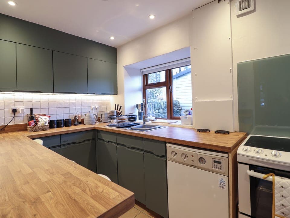 Fridge, electric kettle, toaster, cookware/dishes/utensils