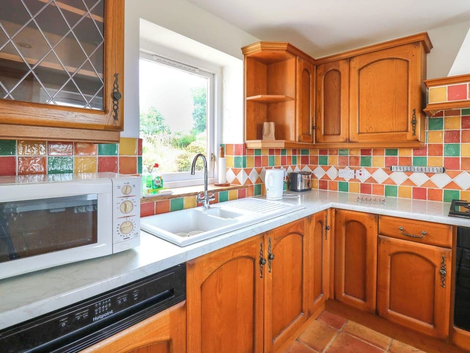 Fridge, dishwasher, electric kettle, cookware/dishes/utensils