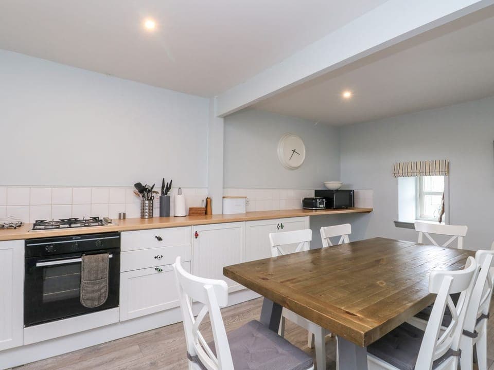 Fridge, dishwasher, electric kettle, cookware/dishes/utensils