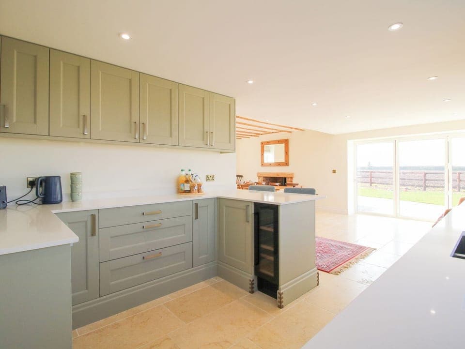 Fridge, dishwasher, electric kettle, cookware/dishes/utensils