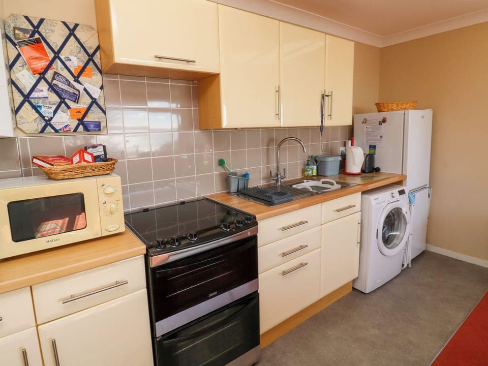 Fridge, electric kettle, toaster, cookware/dishes/utensils