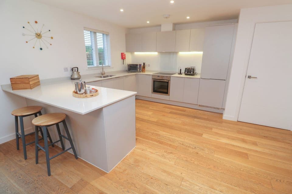 Fridge, electric kettle, toaster, cookware/dishes/utensils