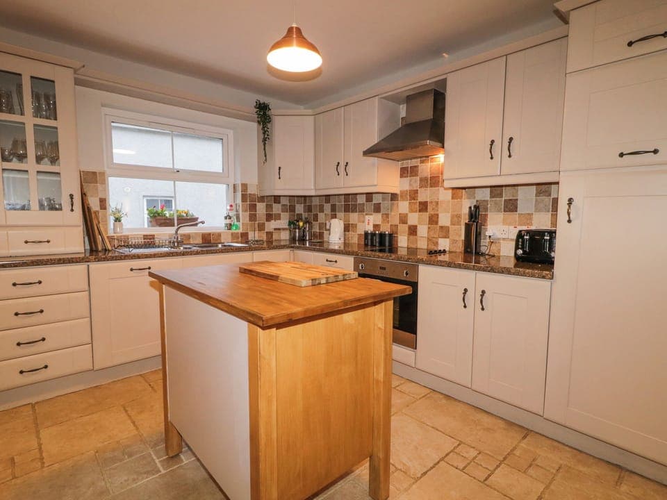 Fridge, electric kettle, toaster, cookware/dishes/utensils